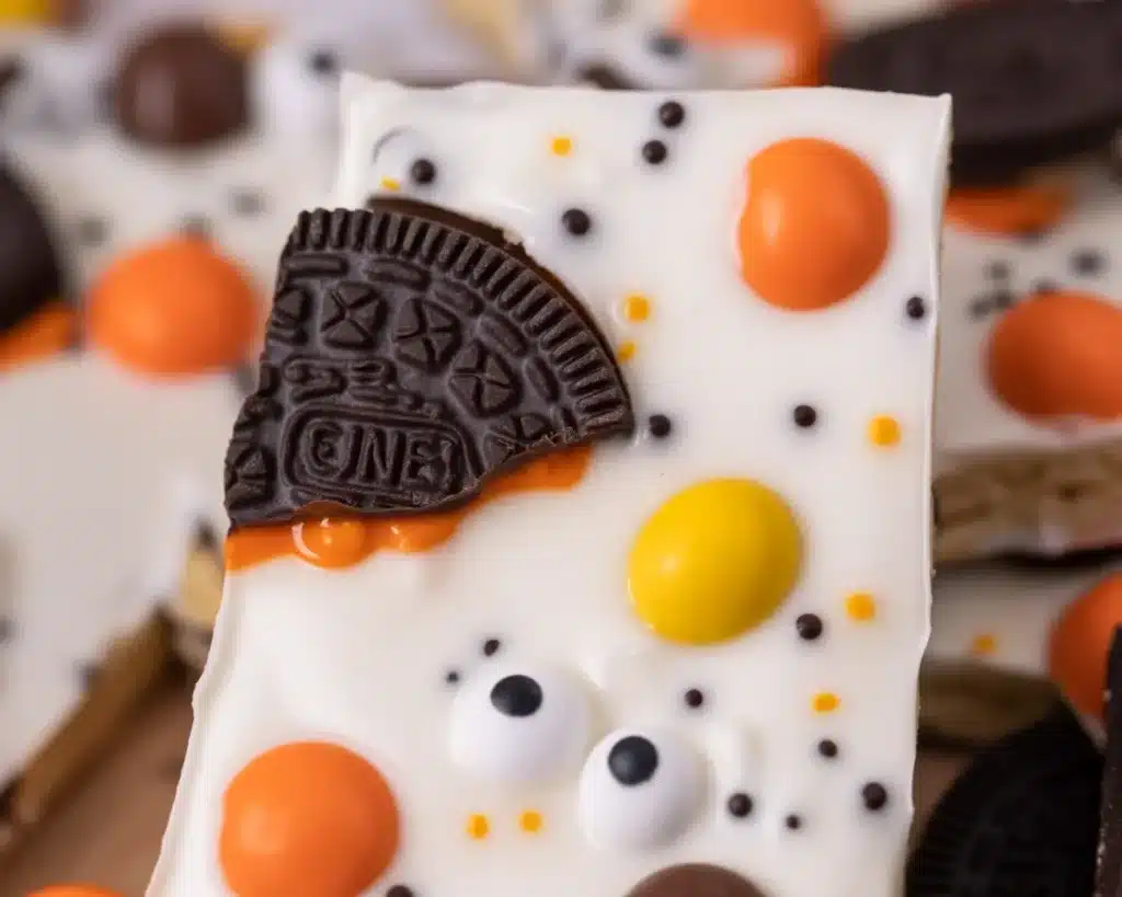 Spooky Halloween Cookie Bark with Oreos and colorful candies for a festive treat.
