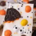 Spooky Halloween Cookie Bark with Oreos and colorful candies for a festive treat.