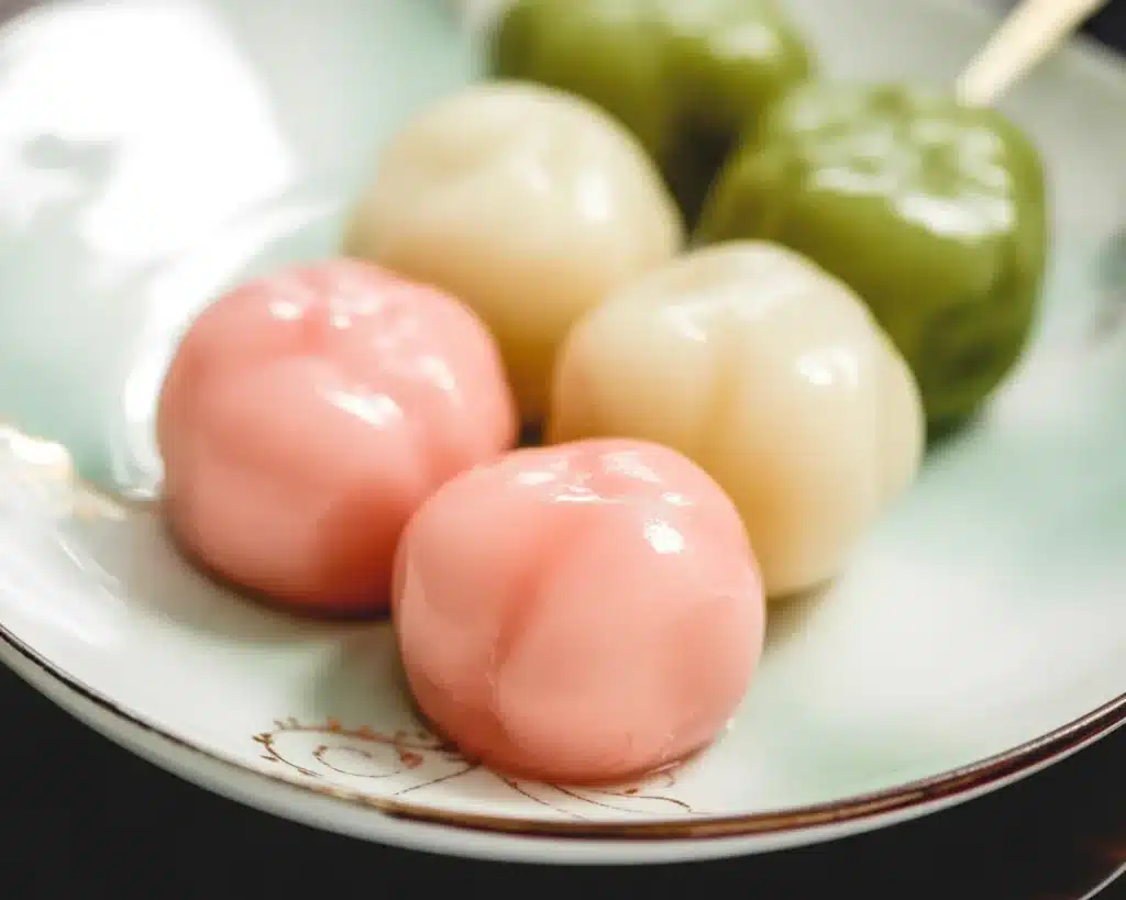 Mitarashi Dango skewers drizzled with sweet soy sauce, traditional Japanese dumplings.