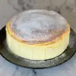 Fluffy Japanese Cheesecake with a jiggly top and dusting of powdered sugar.