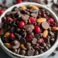 A spooky and sweet Vampire Bite Trail Mix with chocolate, pretzels, and candy corn.