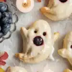 Vegan Blueberry Ghost Hand Pies with blueberry filling and lemon glaze, perfect for Halloween.