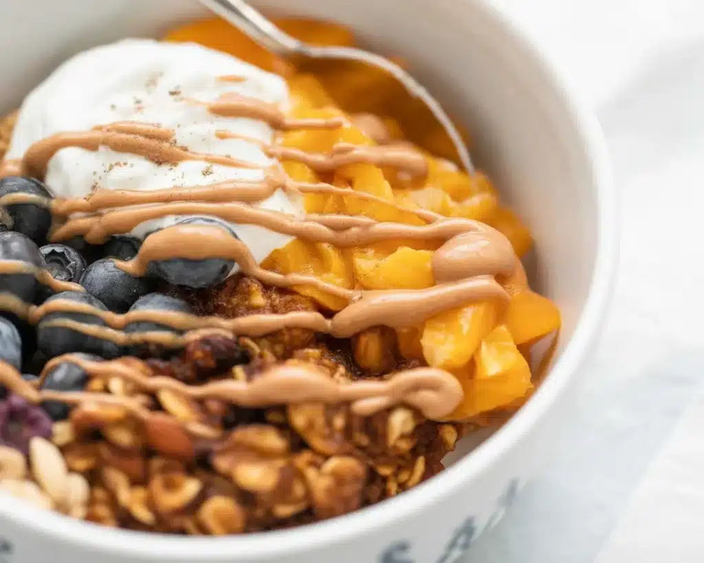 Savory sweet potato breakfast bowl with eggs, avocado, and veggies.