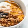 Savory sweet potato breakfast bowl with eggs, avocado, and veggies.