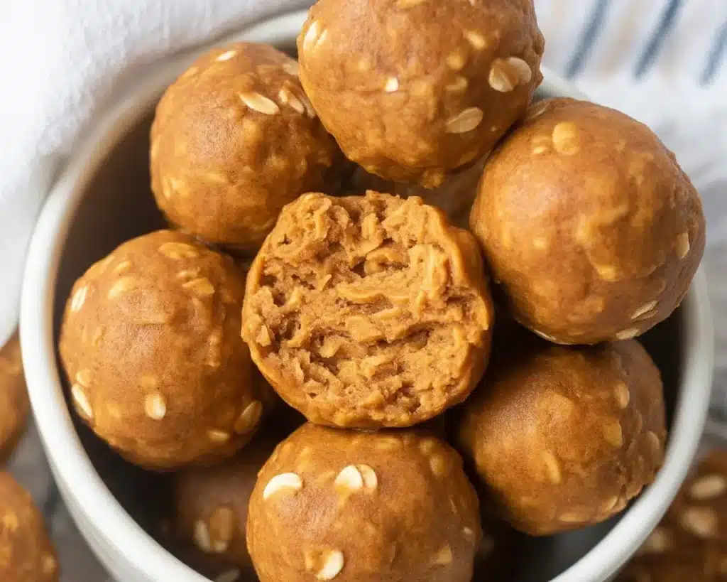 No-bake Pumpkin Protein Balls, a healthy snack with chocolate chips and 8g of protein.