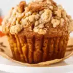 Freshly baked Apple Pumpkin Streusel Muffins with a crumbly topping.