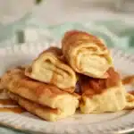 Xango Dessert featuring crispy tortillas filled with rich cheesecake and cinnamon sugar.