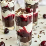 A decadent Black Forest Trifle layered with chocolate cake, cherry filling, and whipped cream.