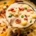 Delicious crock pot crack potato soup, creamy and loaded with bacon, perfect for cozy meals.