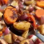 Maple Dijon Roasted Apples and Carrots served in a bowl, showcasing caramelized texture.