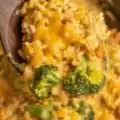 Crockpot Cheesy Chicken Broccoli Rice served on a plate, featuring tender chicken and vibrant broccoli.