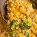 Crockpot Cheesy Chicken Broccoli Rice served on a plate, featuring tender chicken and vibrant broccoli.