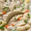 Creamy Crockpot Chicken and Dumplings with biscuit dumplings and tender chicken