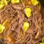 Delicious Crockpot Mississippi Pot Roast with tender beef and flavorful seasoning.