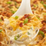 Creamy Million Dollar Chicken Casserole topped with buttery crackers