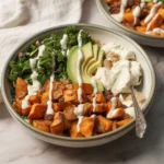 Healthy Chicken and Sweet Potato Rice Bowl with kale and roasted ingredients