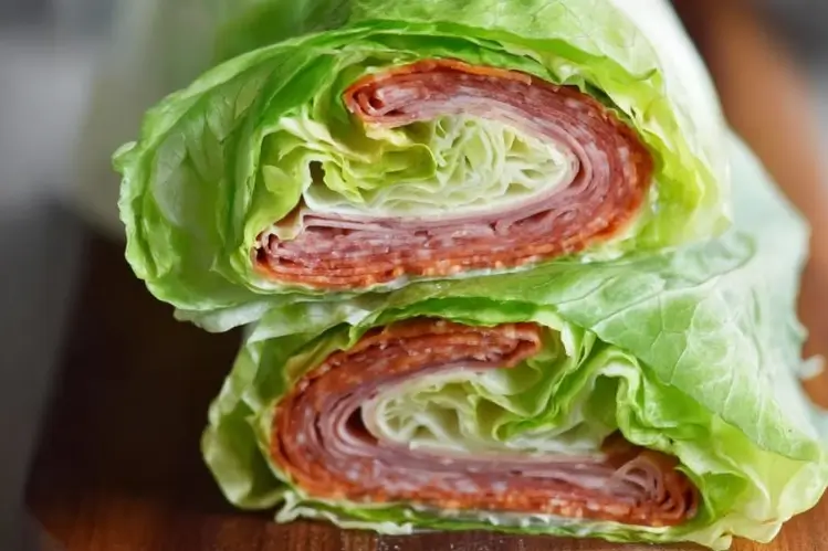 Easy Keto Italian Lettuce Wrap filled with turkey, cheese, and Italian meats