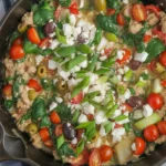 Mediterranean Keto Ground Chicken Skillet with fresh vegetables and herbs