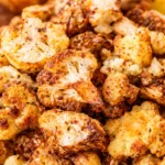 Crispy air fryer cauliflower florets served in a bowl.