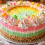 Colorful Easter No Bake Jello Pie in a graham cracker crust topped with whipped cream.