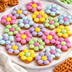 Delicious Flower Pretzel Bites with candy melts and M&Ms for a sweet salty treat.