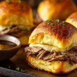Delicious French Dip Sliders served with dipping sauce