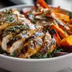 Maple Dijon Chicken served with roasted sweet potatoes in a bowl.