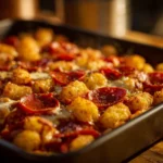 Delicious Pizza Tot Casserole topped with cheese and pepperoni, perfect for family meals.