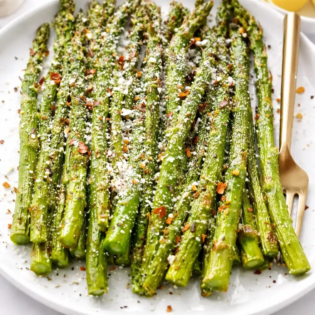 Air fryer roasted asparagus with olive oil and seasoning in a basket