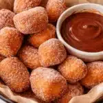 Crispy Air Fryer Churro Bites coated in cinnamon sugar, golden with a soft interior.