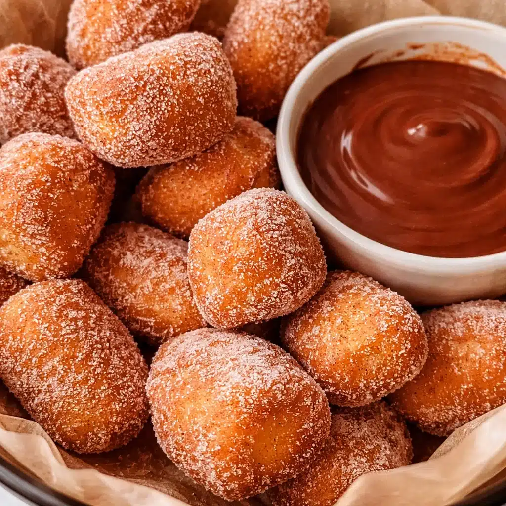 Crispy Air Fryer Churro Bites coated in cinnamon sugar, golden with a soft interior.
