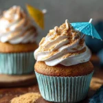 Delicious beach cupcakes decorated with beach-themed toppings and colors