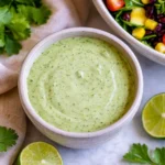 Cilantro Lime Greek Yogurt Dressing drizzled over a fresh salad
