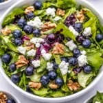 Colorful Tasty Easter Spring Salad with Goat Cheese and seasonal vegetables