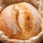 Freshly baked sourdough bread with a crispy crust and soft interior