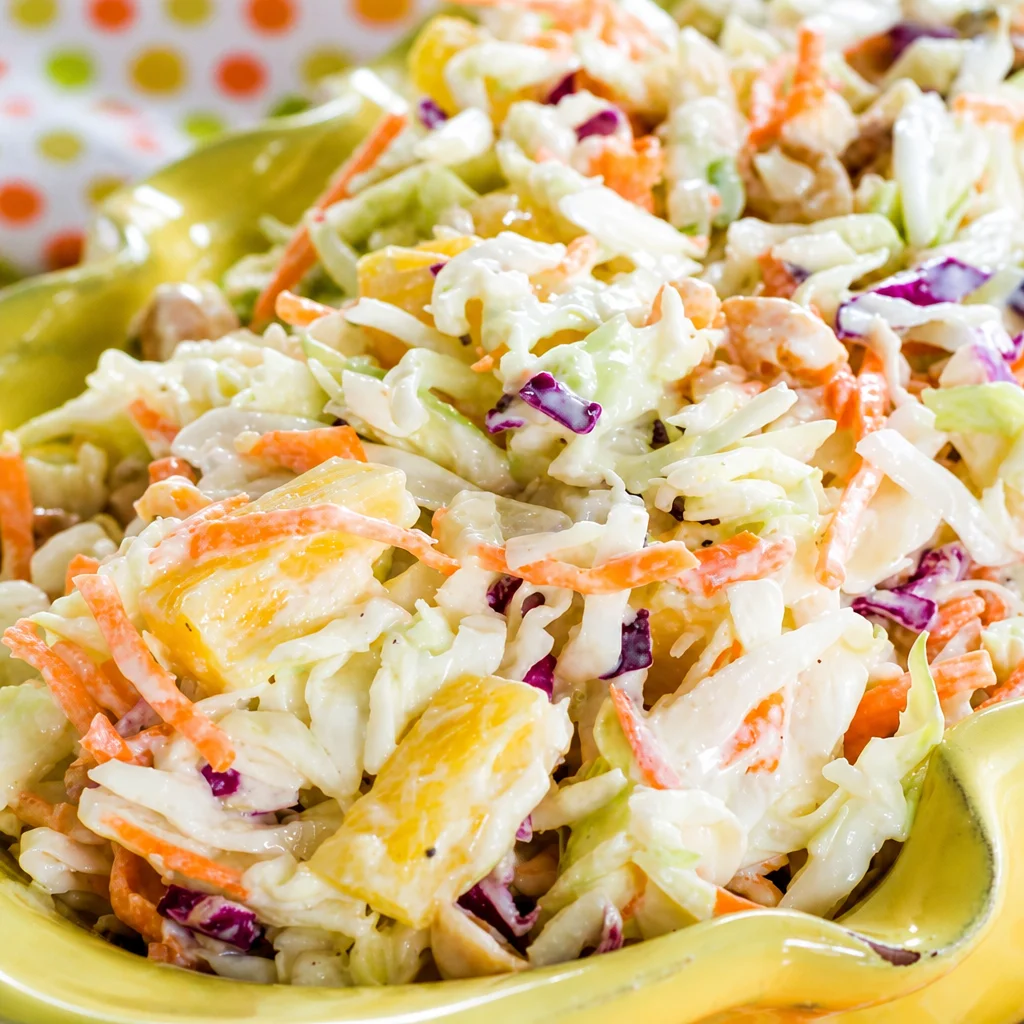Hawaiian Pineapple Coleslaw with pineapple, cabbage, and creamy dressing.