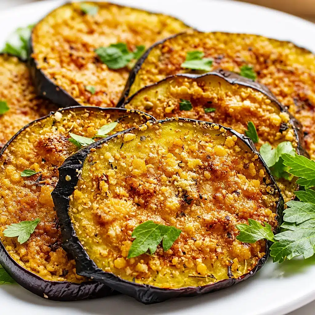 Crispy air fryer eggplant slices served on a plate