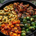One Pan Autumn Chicken Dinner with Roasted Vegetables on a rustic table