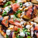 Delicious Fig Prosciutto Flatbread Pizza with fig jam and crispy prosciutto.