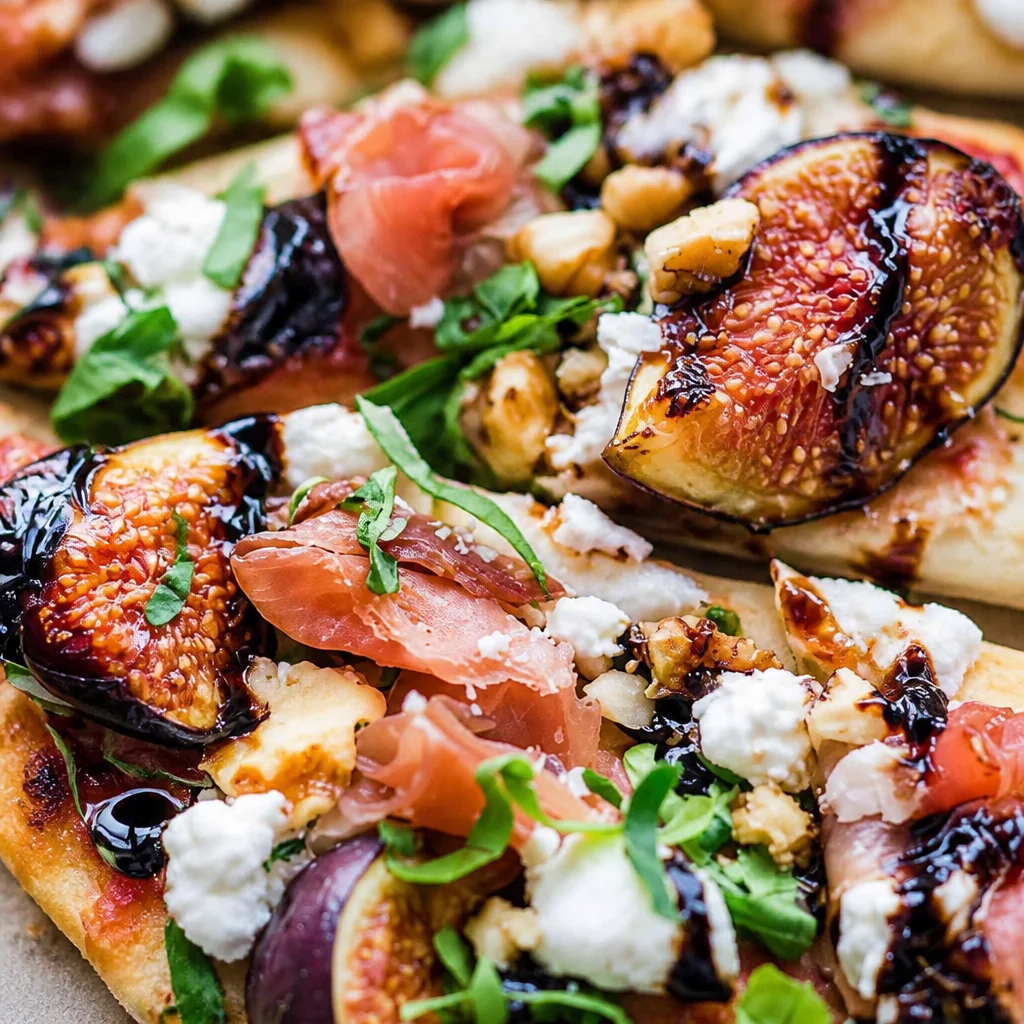 Delicious Fig Prosciutto Flatbread Pizza with fig jam and crispy prosciutto.
