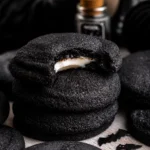 Delicious Black Velvet Cheesecake Cookies filled with creamy cheesecake filling.